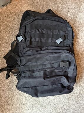 Black Tactical-Style MOLLE Backpack with Multiple Pockets